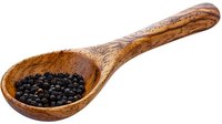 Rustic wooden spoon filled with whole black peppercorns against white background, showcasing natural wood grain texture and aromatic spice for culinary concepts.