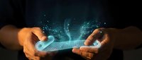 Digital transformation concept with hands holding smartphone displaying futuristic holographic data network and connectivity graphics for business technology.