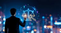 Businessman touching digital justice scales hologram with gavel symbol. Legal technology concept for law firms, attorneys, and judicial system innovation.
