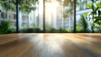 Empty wooden table with blurred green garden and building background, sunlight streaming through foliage, perfect for product display mockups.