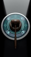 Wooden gavel positioned on circular dial featuring legal symbols and scales of justice, representing law, judgment, and courtroom authority for legal services and litigation concepts.