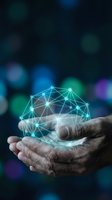 Hands holding glowing digital network sphere with connected nodes and lines representing technology, innovation, connectivity and data visualization concept.