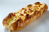 Freshly baked cheese garlic bread with melted mozzarella and golden-brown crust, perfect for restaurant menu, food delivery advertising, or culinary blog presentation.