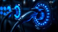 Electric vehicle charging plug with glowing blue LED ring connector on dark background, modern sustainable transport technology concept.
