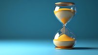 Elegant hourglass with golden sand against teal background, symbolizing time management, deadlines, and business decisions.
