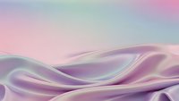Smooth flowing silk fabric with soft pastel gradient colors creating elegant waves and curves for luxury fashion and textile design projects.