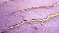Golden kintsugi-style cracks on purple textured surface with metallic gold veins running through rough stone-like material, creating elegant repair pattern.