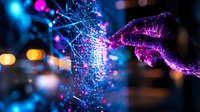 Glowing digital hand touching network of light particles against dark background with blue and pink neon colors creating futuristic connection visualization.
