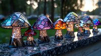Glowing stained glass mushroom lamps in a row create magical garden lighting with colorful illuminated caps in blue, purple, and amber tones against blurred nature background.