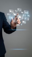 Businessman hand touching digital social media icons with engagement metrics, likes, shares and analytics data for marketing strategy and online presence.