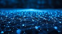 Glowing blue network connections with dots and lines forming digital mesh pattern against dark background, abstract technology concept visualization.