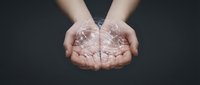 Hands holding glowing digital globe with network connections representing global communication, technology innovation and worldwide connectivity concepts.