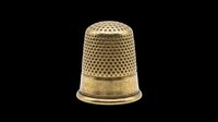 Gold vintage sewing thimble isolated on transparent background, ready for clipart, stickers, print on demand, sublimation, and t-shirt design use.