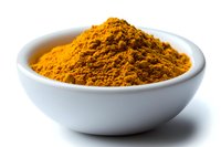 Ground turmeric powder in white ceramic bowl on white background. Bright yellow-orange aromatic spice used in Asian cuisine and natural medicine.