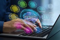 Business professional using laptop with AI brain hologram and colorful tech icons representing artificial intelligence, machine learning and digital innovation.