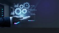 Business hand presenting holographic data analytics icons with gears, charts and clock symbols for digital transformation and productivity solutions.