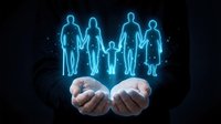 Hands holding glowing neon family silhouettes on dark background. Concept for family protection, insurance, care, support services, and relationships.