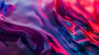 Vibrant liquid abstract background with flowing red, purple and blue colors creating dynamic swirling patterns and smooth fluid motion texture for creative designs.