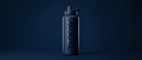 Dark blue insulated water bottle with flip-top cap on navy background, suitable for beverage packaging mockups and sports hydration product marketing.