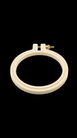 Cream embroidery hoop with brass screw mechanism, isolated on transparent background. Ready for clipart, t-shirt designs, print-on-demand products, stickers, and craft projects.