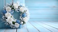 Elegant winter wreath with white roses, blue berries, and silver accents on light blue wooden door, perfect for seasonal home decoration.