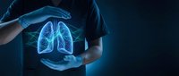 Healthcare professional protecting glowing lung hologram with hands showing respiratory care and pulmonary health protection concept on dark background.