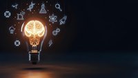 Glowing light bulb with brain filament surrounded by innovation icons on dark background representing creativity and business ideas for presentations.