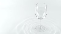 Empty wine glass on white background with elegant shadow and reflection, isolated glassware for restaurant menu design and beverage presentation.