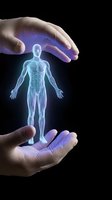 Protective hands surrounding glowing holographic human anatomy figure representing healthcare insurance medical protection and wellness care concepts.