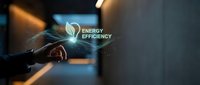 Professional businessman touching holographic energy efficiency icon with glowing light effects in modern office environment for sustainable technology concepts.