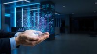 Businessman hand holding holographic brain with data analytics charts and graphs in modern office environment for artificial intelligence concepts.