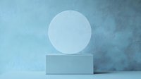 Minimalist geometric composition with white circle on cube against ethereal blue foggy background, modern display podium for product presentation.