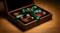 Luxury chocolate assortment in wooden box with green ribbon bow, featuring truffles and pralines on warm wood surface for gourmet gifting.