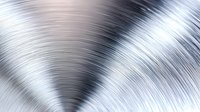 Brushed metal surface with radial pattern showing polished stainless steel texture with light reflection and curved lines creating dynamic industrial background.