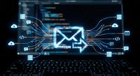Glowing email icon with digital circuit lines on laptop background, representing modern communication and data transfer technology.