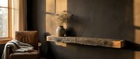 Cozy interior corner with warm sunlight streaming through window, rustic wooden shelf displaying dried flowers in ceramic vase, comfortable armchair with throw blanket, minimalist home decor.