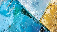 Vibrant abstract composition with water droplets and geometric shapes in turquoise blue and golden yellow colors creating dynamic diagonal lines and reflective surfaces.