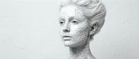 Young Caucasian woman with blonde updo hairstyle wearing white clay facial mask for skincare routine, beauty treatment and spa wellness concept.