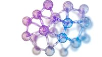 Molecular structure with gradient color transition from purple to blue spheres connected by bonds on white background, suitable for scientific presentations.