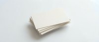 Open blank notebook with white pages on light background, ready for writing, planning, journaling, or design mockups.