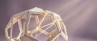 Geometric crystal structure with warm golden light illuminating translucent faceted surfaces against soft purple gradient background, suitable for abstract design and modern graphics.