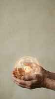 Elderly hands cupping glowing peace symbol with warm light effects representing hope, harmony and spiritual protection for wellness concepts.
