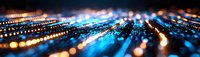 Abstract technology background with glowing blue and orange light trails creating dynamic motion effect against dark surface, modern digital concept panorama.