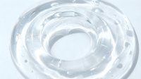 Transparent clear plastic ring isolated on white background, ready for design mockups, product packaging, and commercial applications.