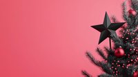 Minimalist Christmas tree decorated with black star topper and red ornaments against pink background, modern festive design with copy space for text.