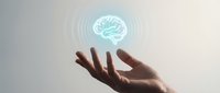 Hand reaching toward glowing brain hologram with radiating waves representing artificial intelligence, neuroscience, mental health and cognitive technology concepts.