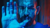 Futuristic man with digital circuit overlay on face reaching hand toward camera in blue and red neon lighting for technology and AI concepts.