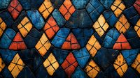 Geometric stained glass pattern in blue, orange and yellow diamond and triangle shapes with dark grout lines creates medieval church window effect.