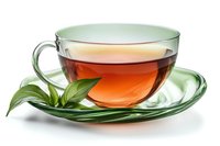 Glass cup of black tea with fresh green tea leaves on transparent saucer against white background, side view. Beverage photography for menu and packaging design.