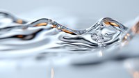 Flowing liquid metal with golden reflections captured in macro photography, showcasing smooth curves and dynamic movement on light background.